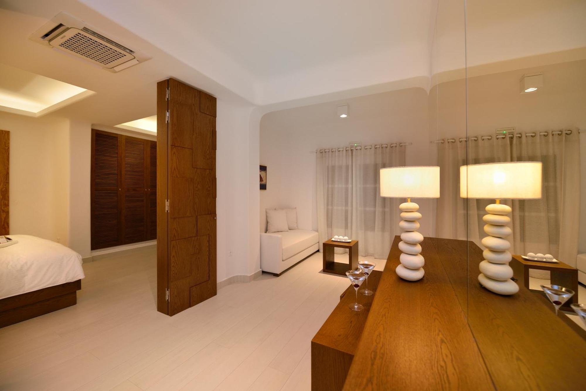 Saint John Hotel Villas & Spa Agios Ioannis Diakoftis Exterior foto A room at the hotel