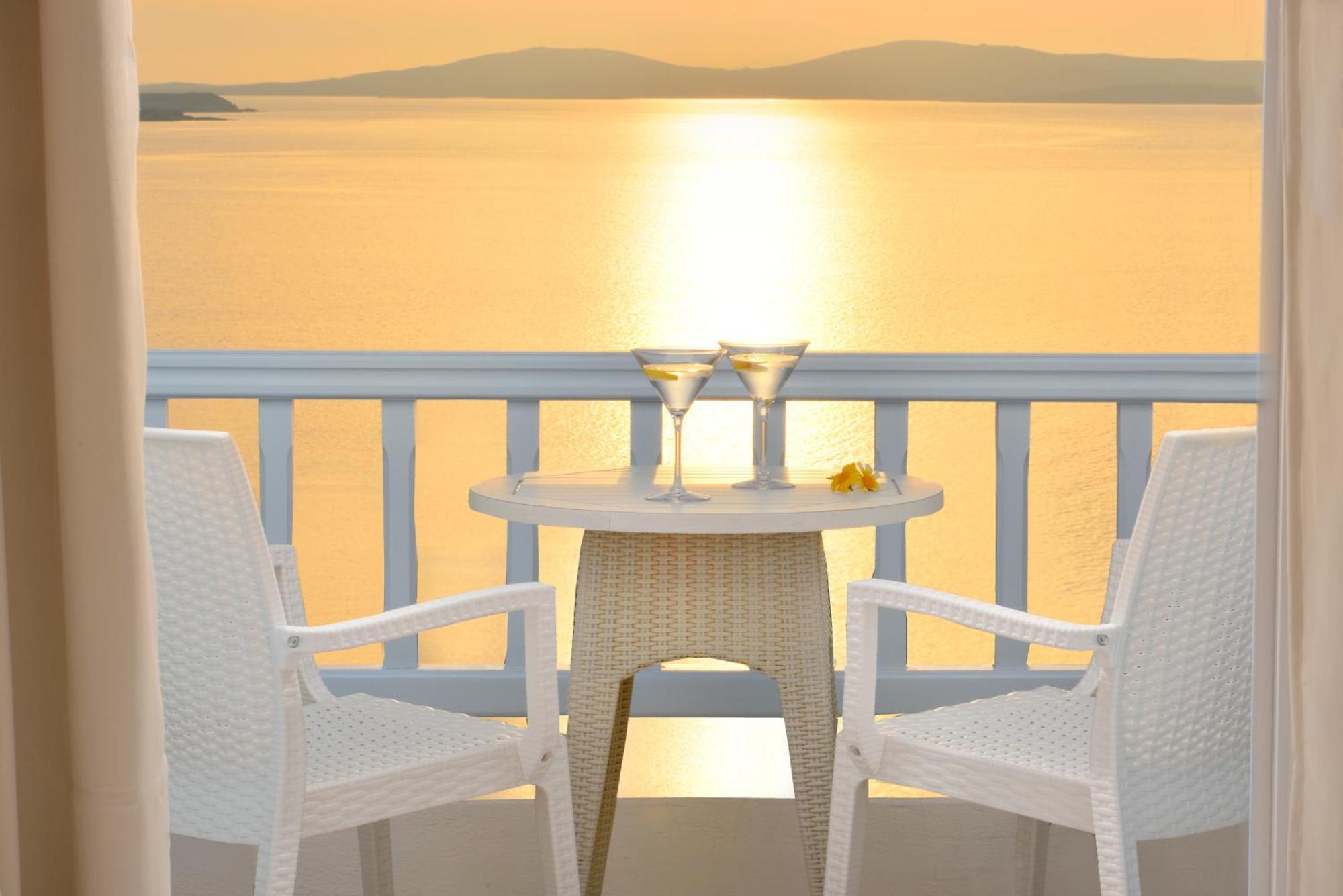 Saint John Hotel Villas & Spa Agios Ioannis Diakoftis Quarto foto Sunset at the hotel