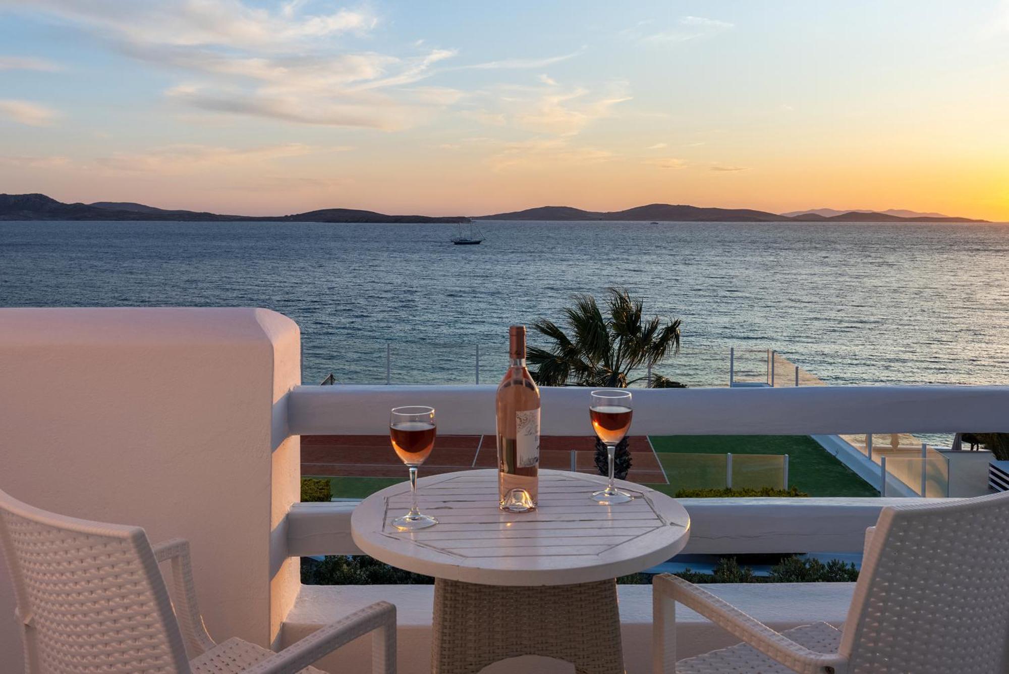 Saint John Hotel Villas & Spa Agios Ioannis Diakoftis Exterior foto Sunset at the hotel