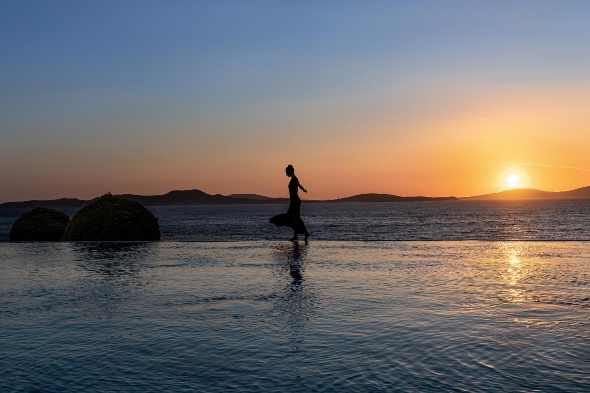 Saint John Hotel Villas & Spa Agios Ioannis Diakoftis Exterior foto Sunset at the beach
